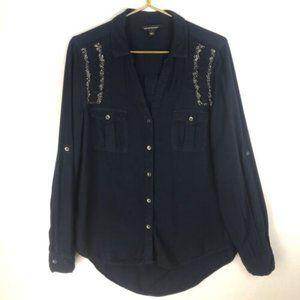 Rock and Republic Navy Hi Low shirt with embellishments on shoulders. C115